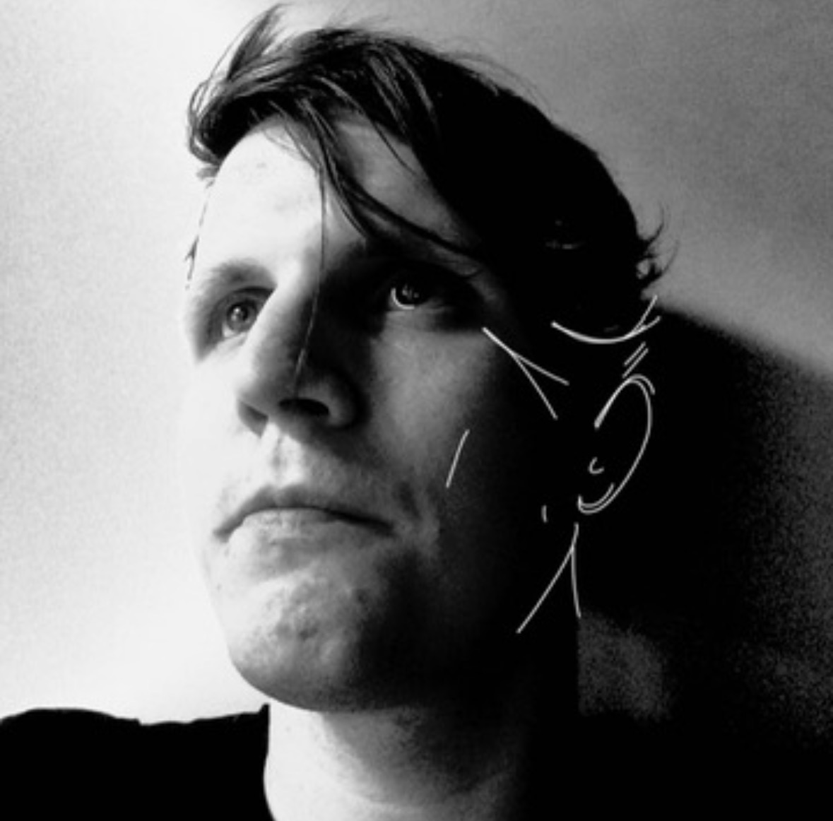 Black-and-white portrait of Michal Drozdzynski